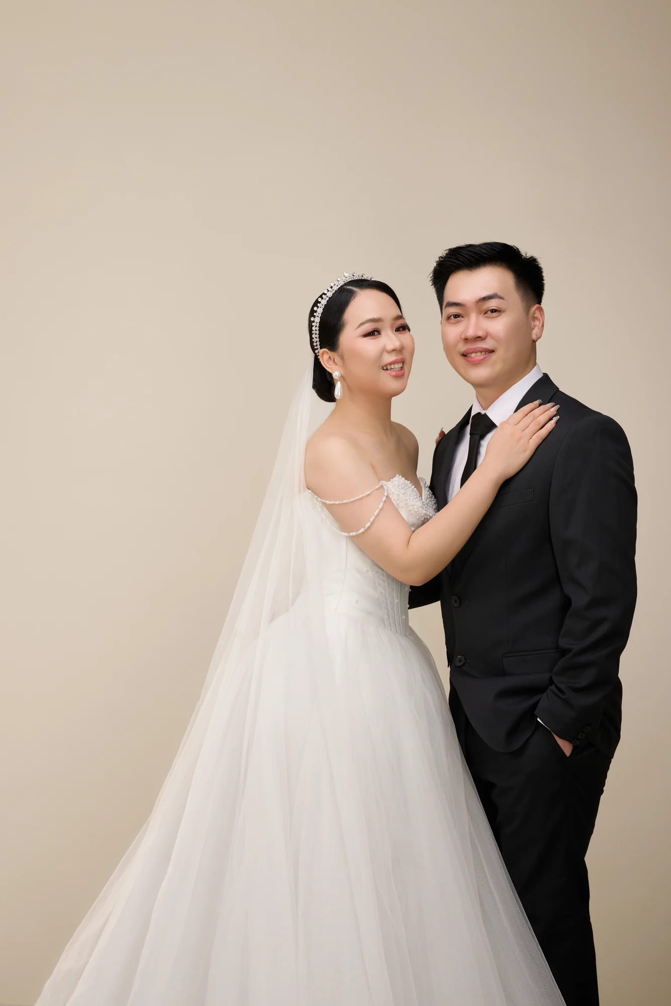 Fernando and Nonira in wedding attire